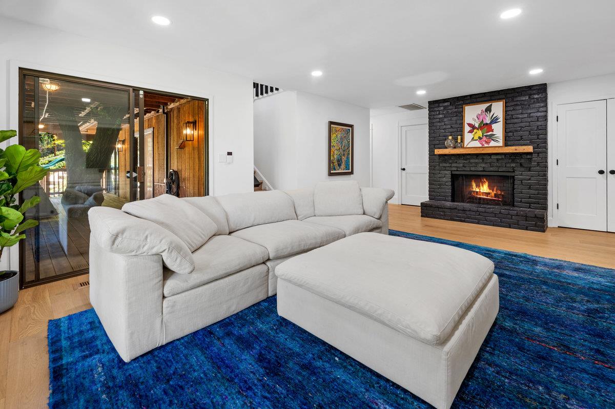 27 Oakwood Road Orinda, CA 94563 - Photo 38 of 61 a living room with furniture and a fireplace