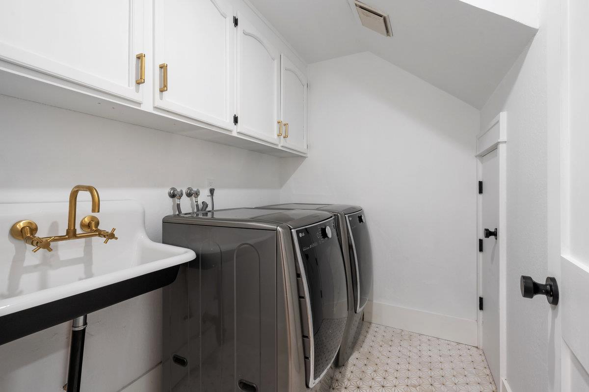 27 Oakwood Road Orinda, CA 94563 - Photo 47 of 61 a utility room with sink dryer and washer
