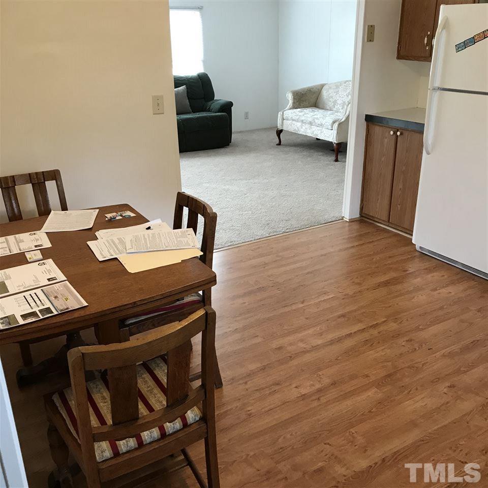 573 George Sherman Road Rougemont, NC 27572 - Photo 6 of 7 a living room with furniture and a couch