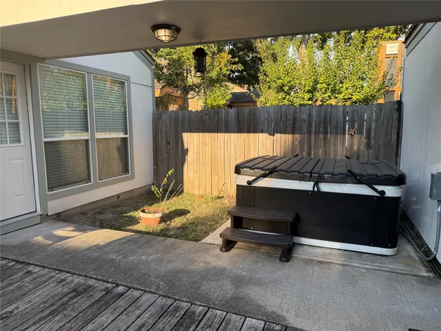 a view of a bench in the patio