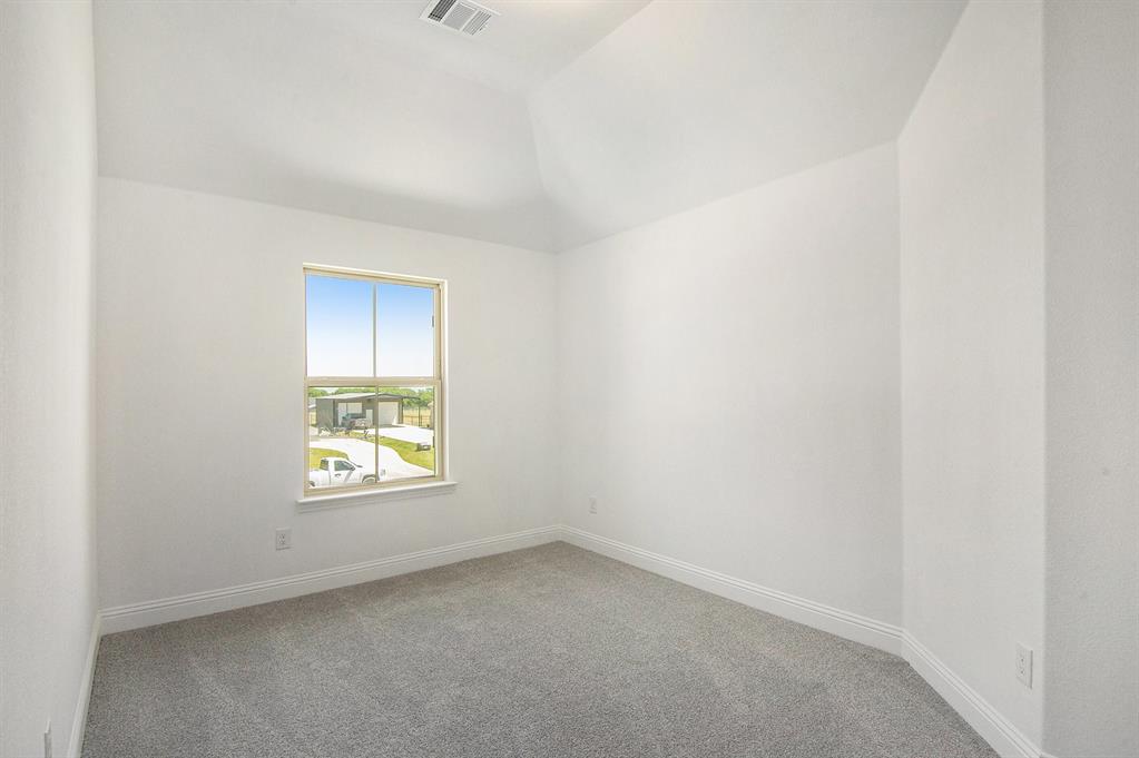 6033 Mango Drive Sanger, TX 76266 - Photo 21 of 29 an empty room with a window