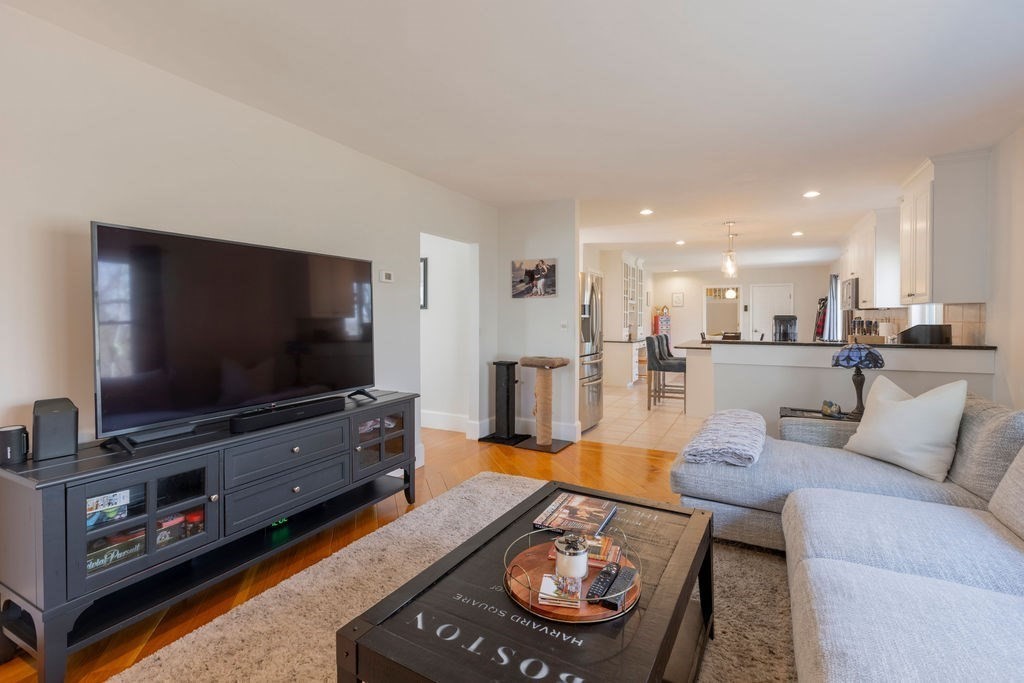 126 Lafayette Street Marblehead, MA 01945 - Photo 3 of 30 a living room with furniture and a flat screen tv