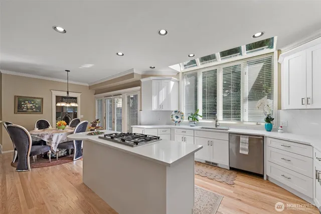 a kitchen with a stove and a refrigerator