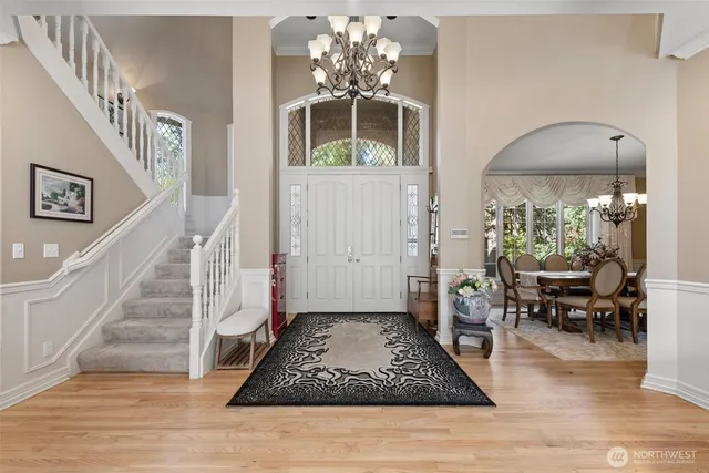 a view of entryway with wooden floor
