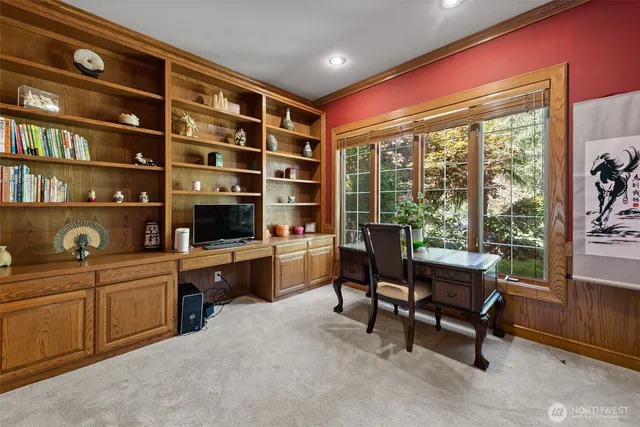 a view of a dining room with furniture a chandelier and wooden floor
