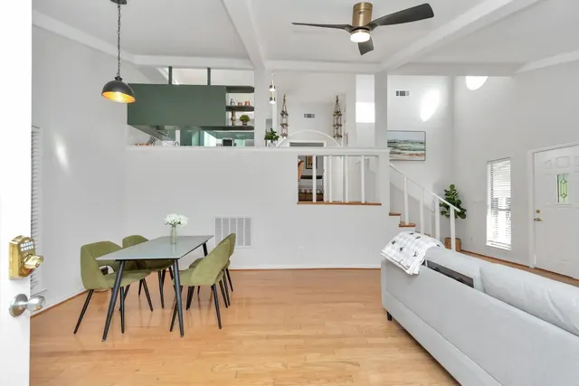 a view of a chair and table in the balcony