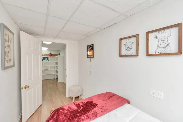 a bathroom with a sink window and shower