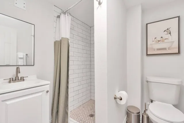 a utility room with washer and dryer