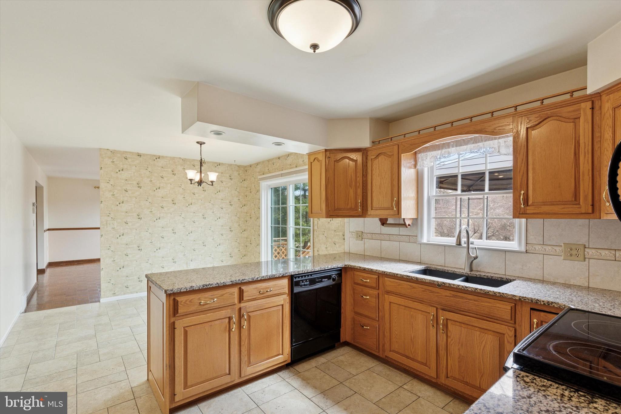82 Starr Road Reading, PA 19608 - Photo 12 of 56 a large kitchen with kitchen island a sink stainless steel appliances and cabinets