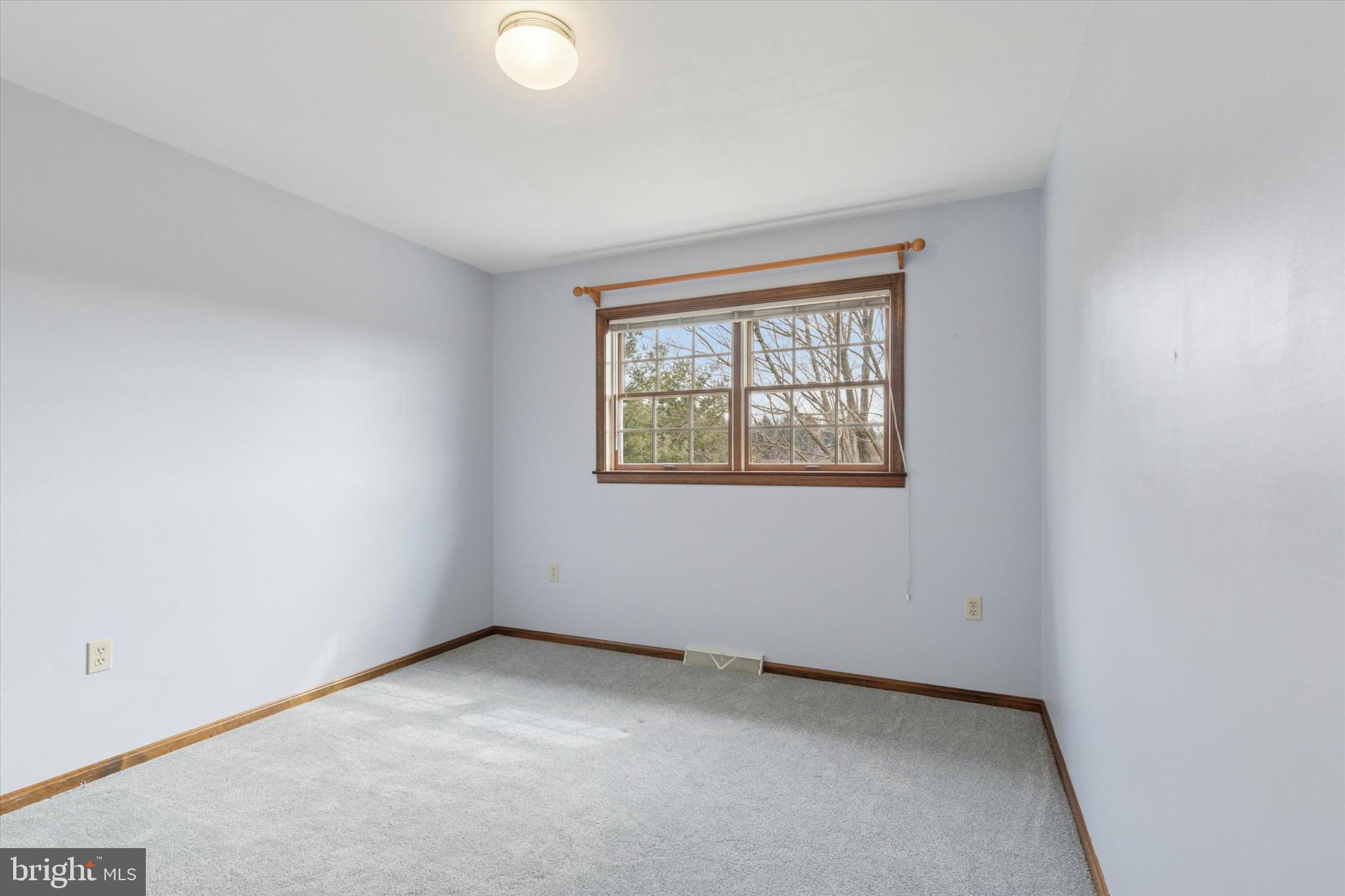 82 Starr Road Reading, PA 19608 - Photo 27 of 56 an empty room with windows
