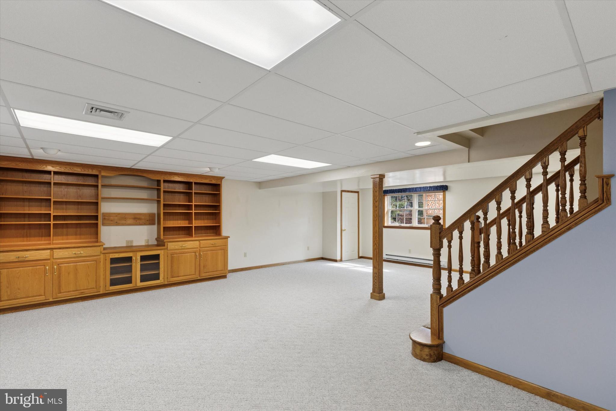 82 Starr Road Reading, PA 19608 - Photo 33 of 56 a view of an empty room with a fireplace and furniture