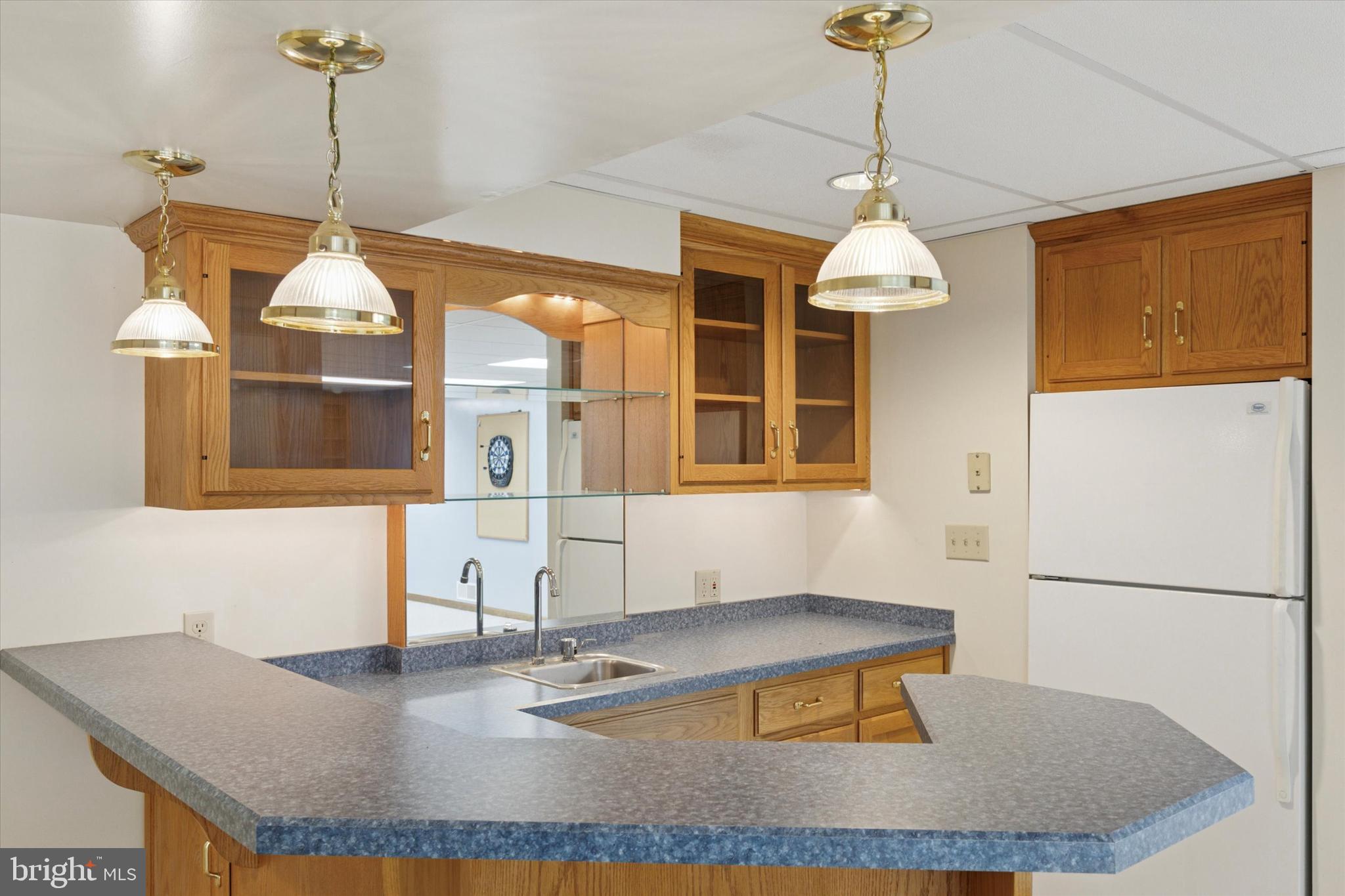 82 Starr Road Reading, PA 19608 - Photo 35 of 56 a room with a chandelier a dining table and a chandelier