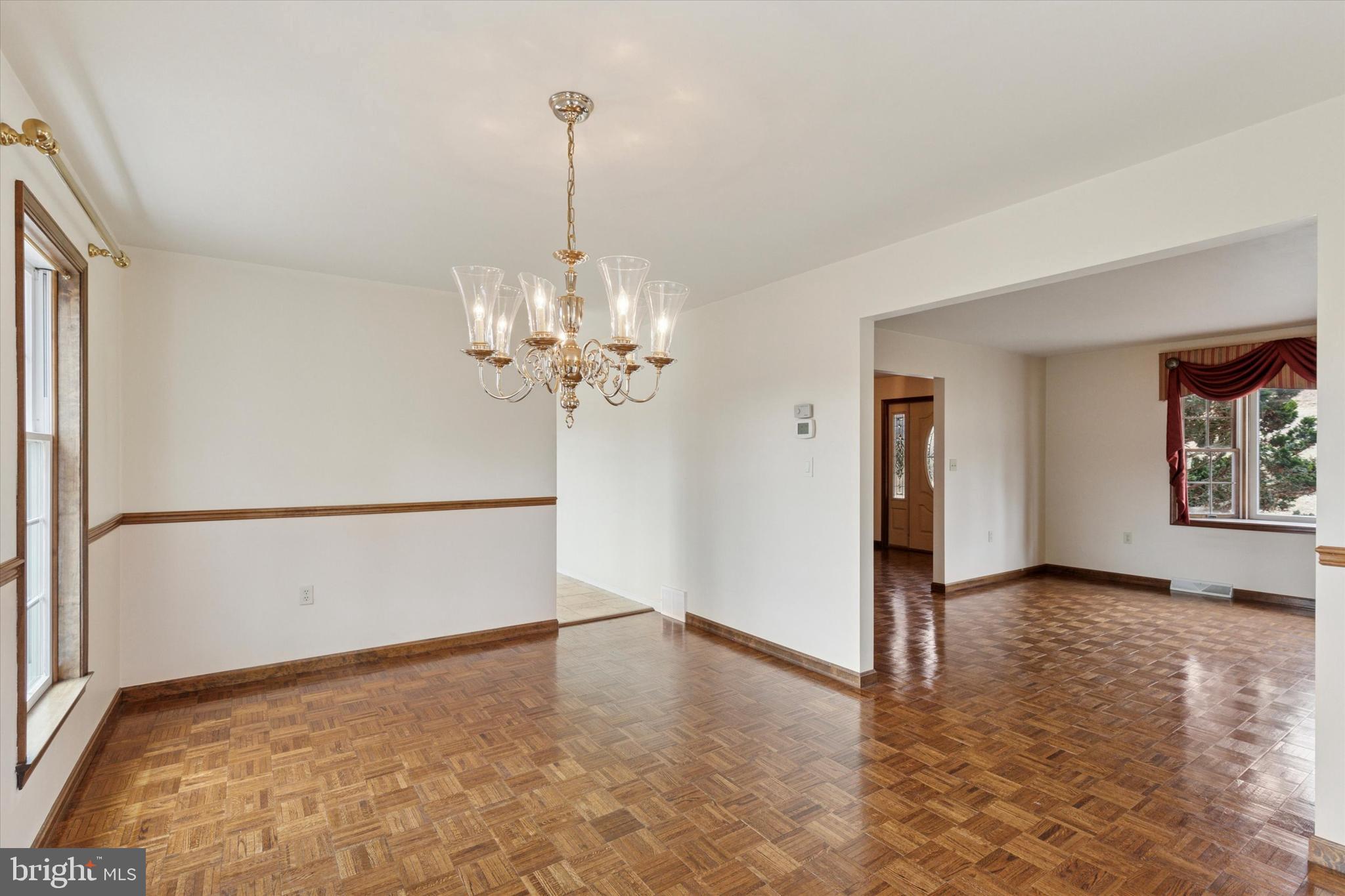 82 Starr Road Reading, PA 19608 - Photo 8 of 56 a view of a livingroom with a dishwasher cabinets and a wooden floor