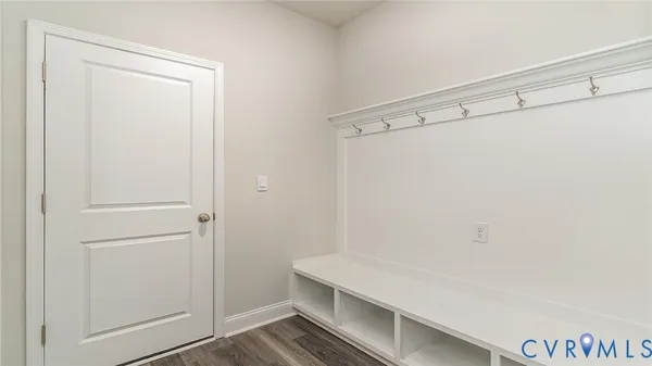 a room with a shower and a sink