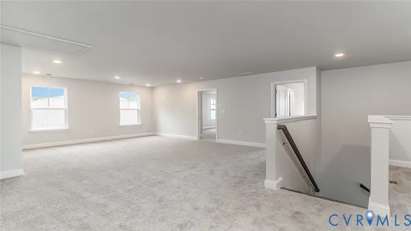 a view of empty room with front door