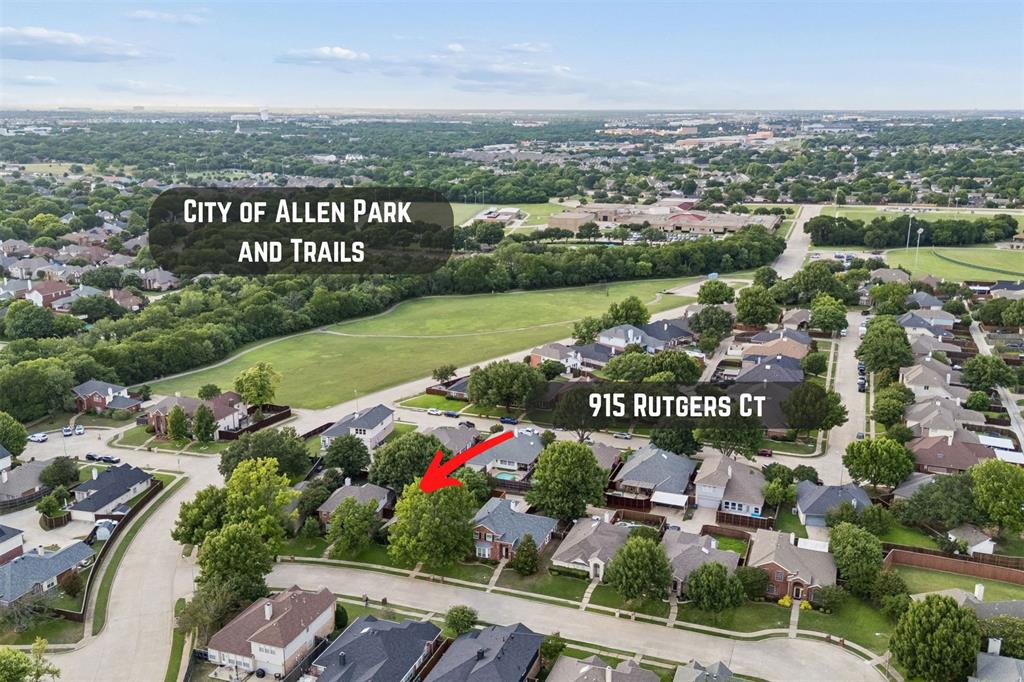 915 Rutgers Court Allen, TX 75002 - Photo 2 of 39 an aerial view of lake and residential houses with outdoor space