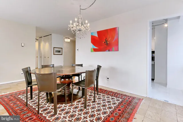 a kitchen with a sink and a refrigerator