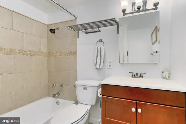 a view of a living room and a balcony