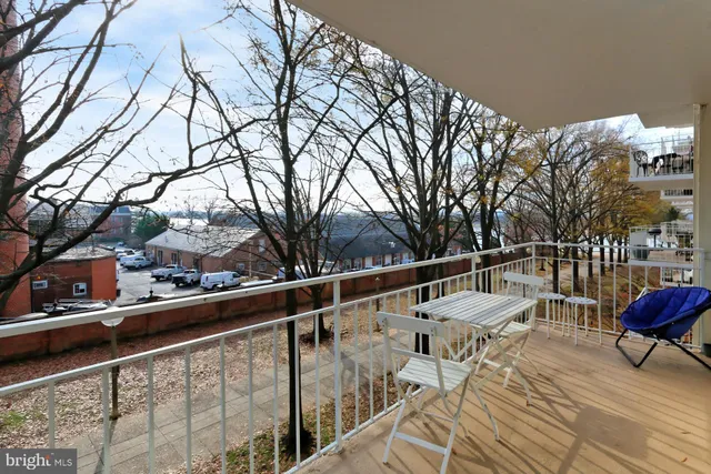a view of a chairs and table on the deck
