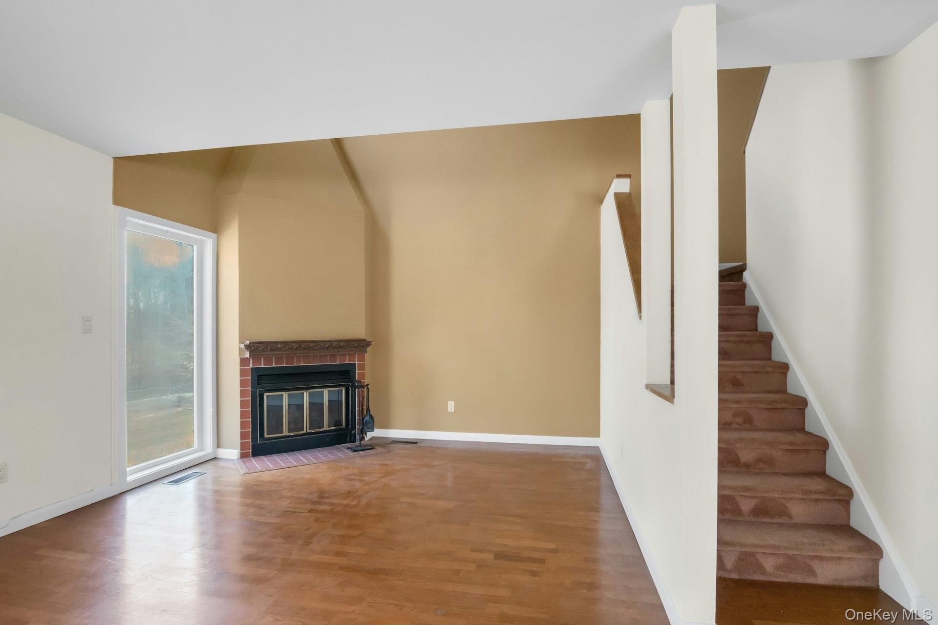 1 Spring Pond Drive, Unit 1 Ossining, NY 10562 - Photo 13 of 34 a view of a livingroom with a fireplace