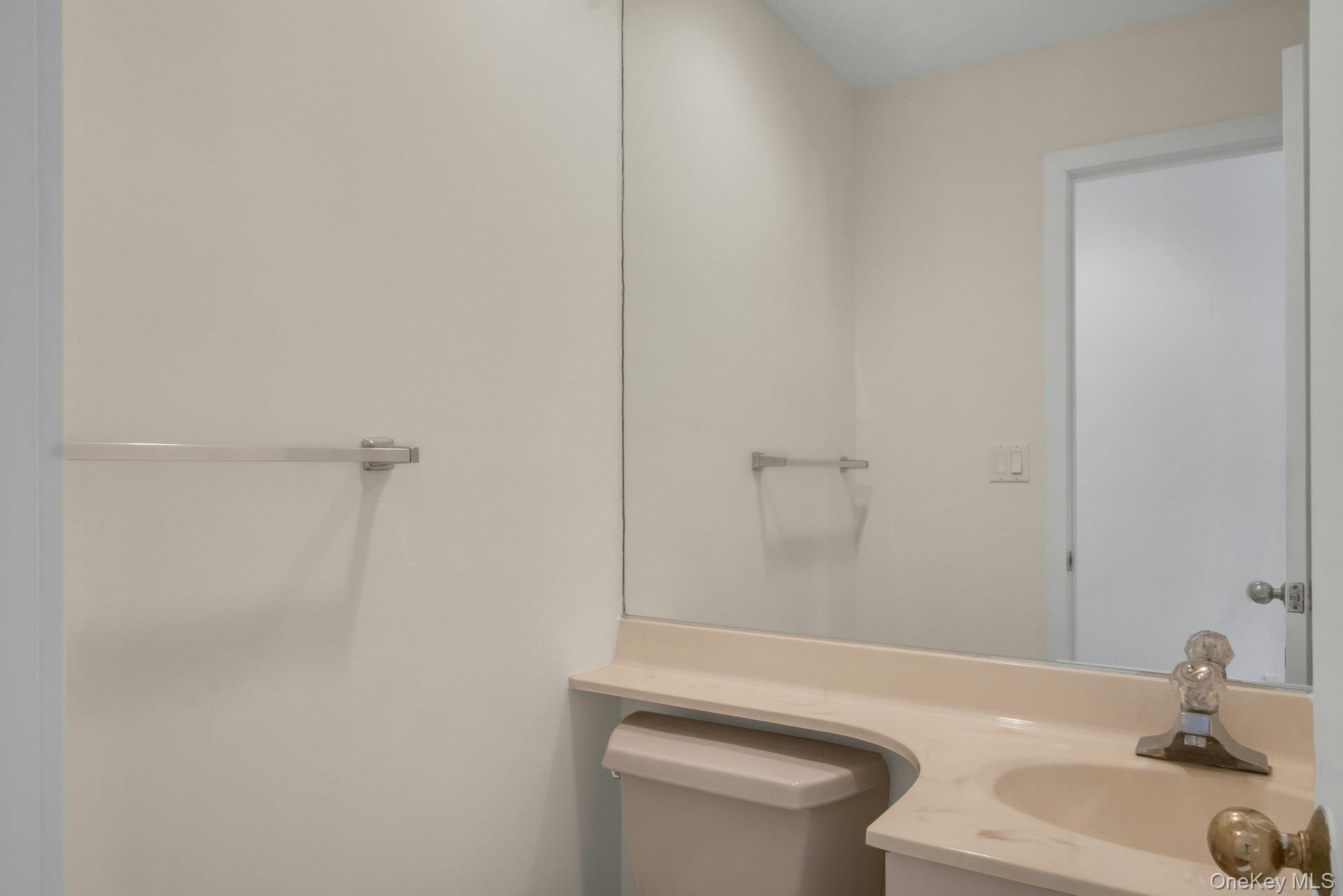 1 Spring Pond Drive, Unit 1 Ossining, NY 10562 - Photo 15 of 34 a bathroom with a sink a toilet and shower