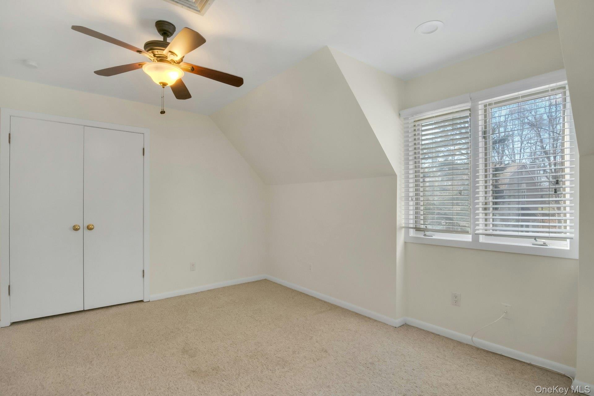 1 Spring Pond Drive, Unit 1 Ossining, NY 10562 - Photo 24 of 34 a view of an empty room with a window