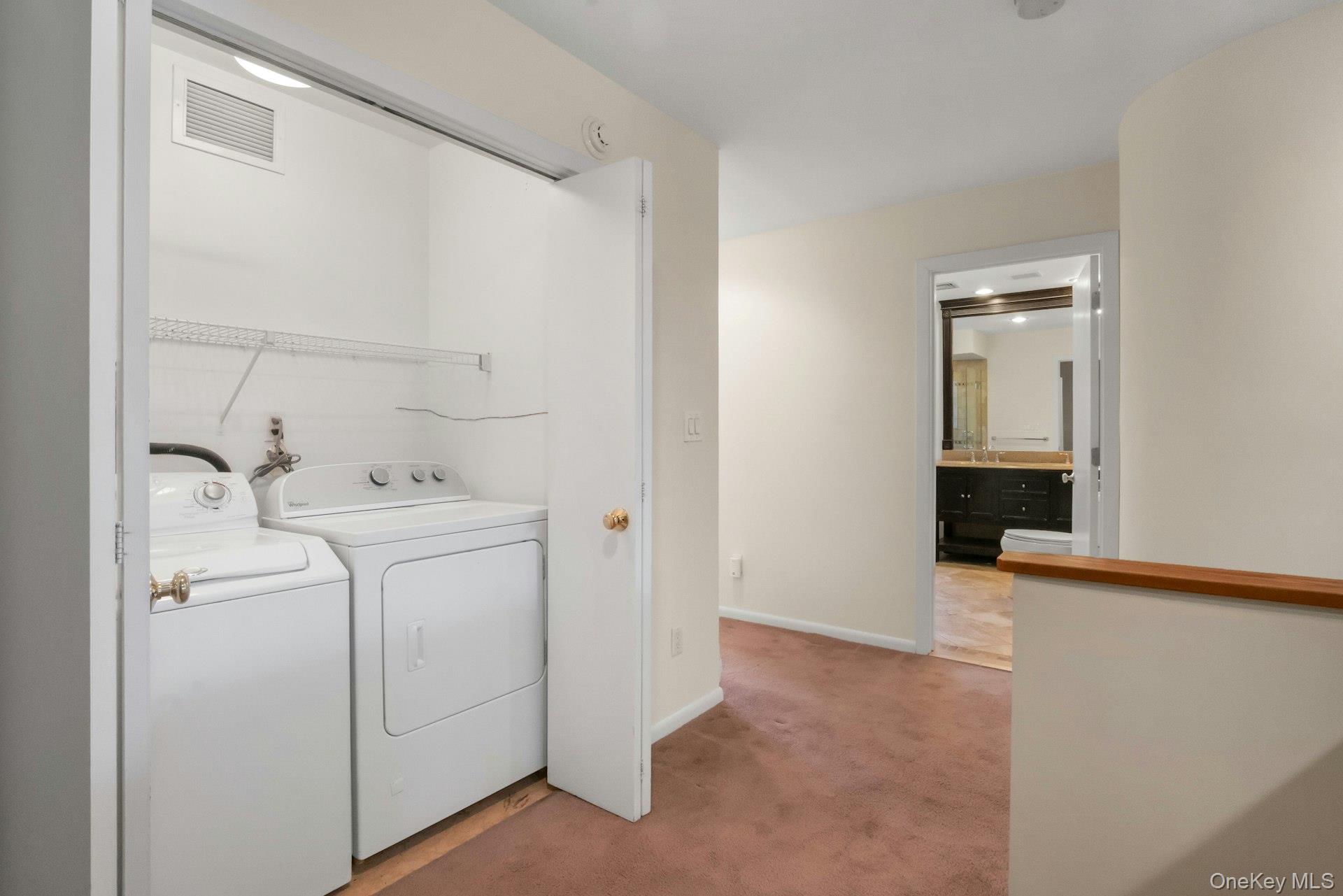 1 Spring Pond Drive, Unit 1 Ossining, NY 10562 - Photo 28 of 34 a utility room with dryer and washer