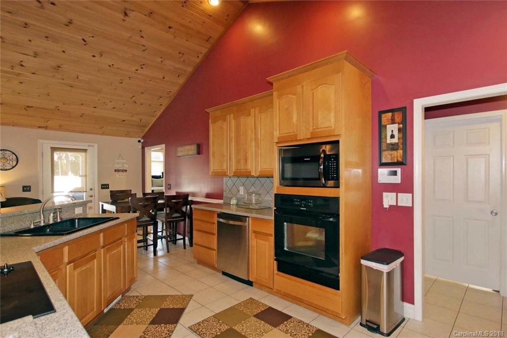 621 Adrian Road Salisbury, NC 28146 - Photo 14 of 36 a kitchen with lots of counter top space