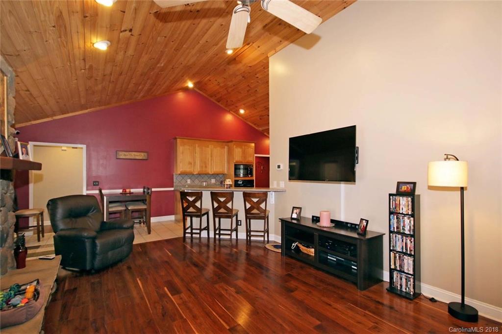 621 Adrian Road Salisbury, NC 28146 - Photo 8 of 36 a living room with furniture and a flat screen tv