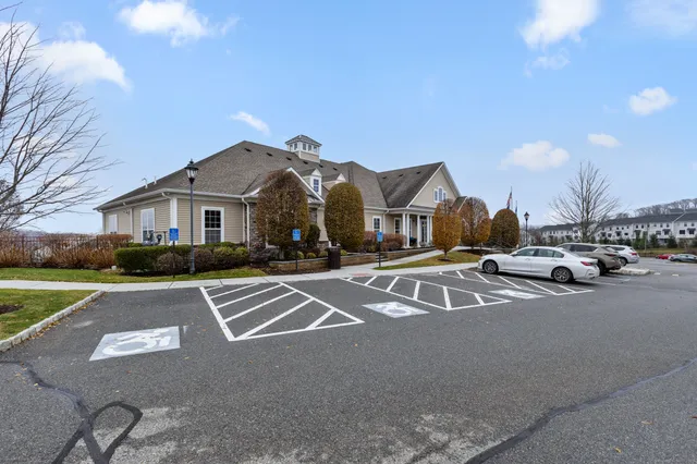 a view of a house with a street