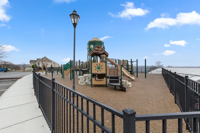 a view of roof deck with seating space