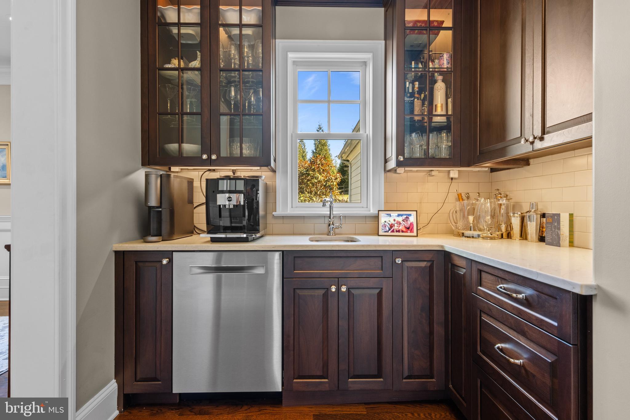 2207 White Horse Road Berwyn, PA 19312 - Photo 16 of 69 a kitchen with stainless steel appliances granite countertop a sink and a stove