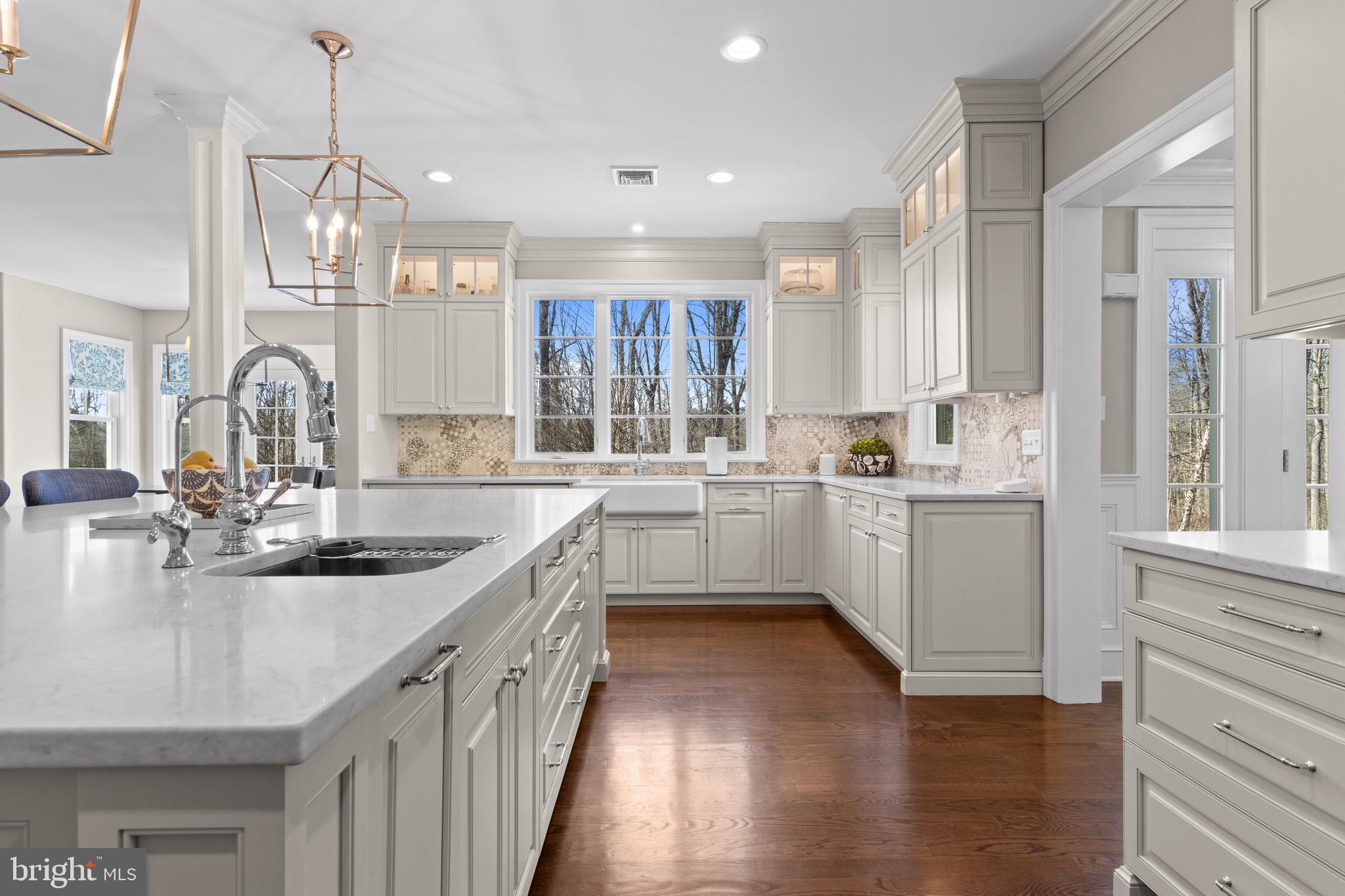 2207 White Horse Road Berwyn, PA 19312 - Photo 20 of 69 a kitchen with a sink cabinets a counter top space and stainless steel appliances