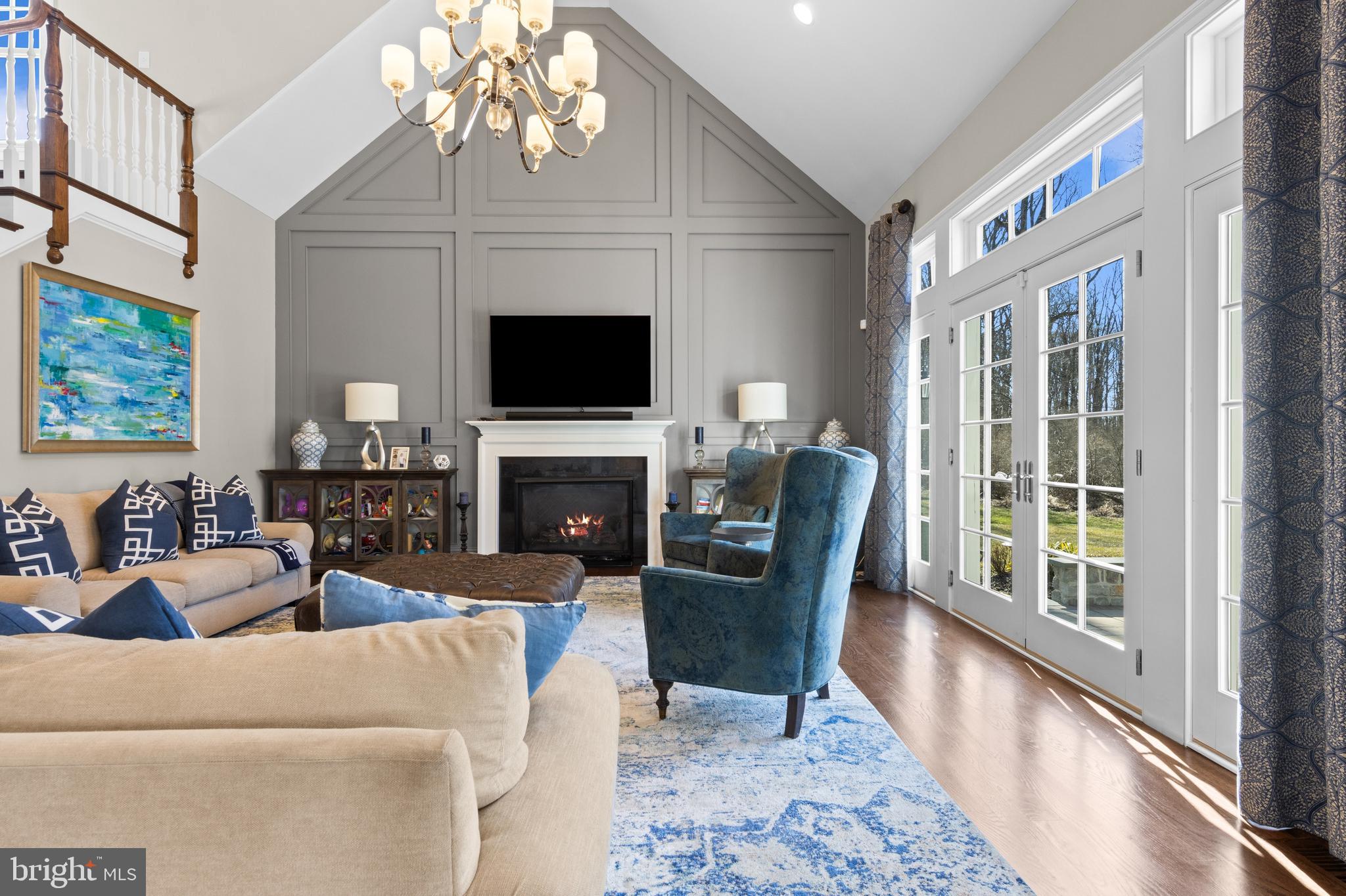 2207 White Horse Road Berwyn, PA 19312 - Photo 26 of 69 a living room with furniture a flat screen tv and a fireplace