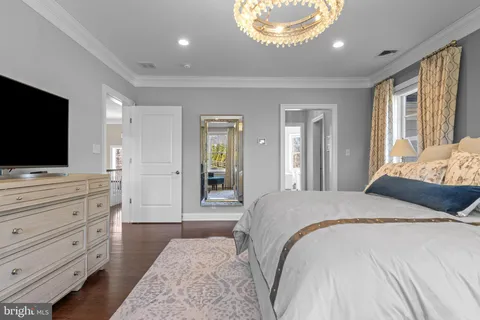 a bedroom with bed and a window