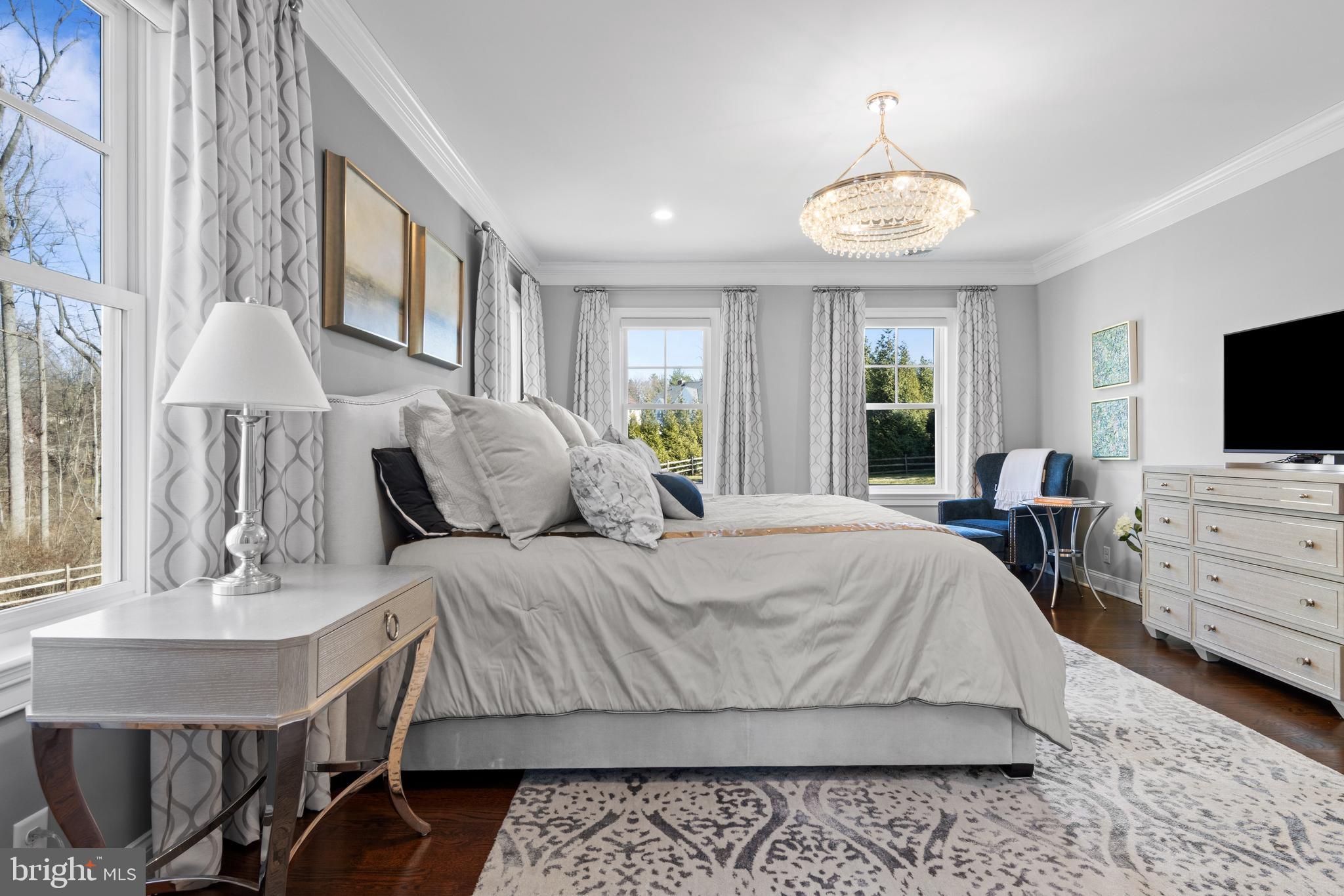 2207 White Horse Road Berwyn, PA 19312 - Photo 34 of 69 a spacious bedroom with a bed and a flat screen tv