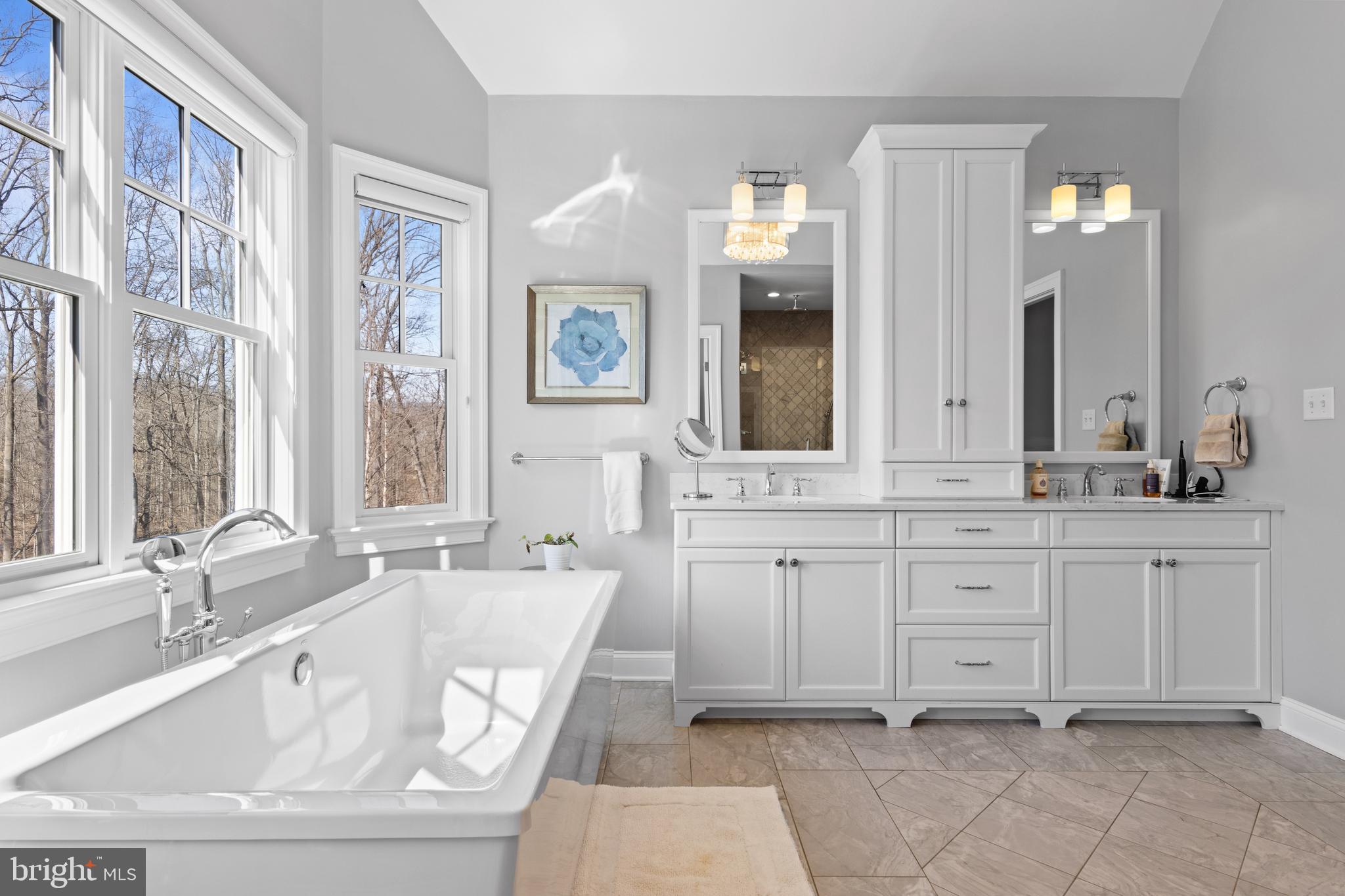 2207 White Horse Road Berwyn, PA 19312 - Photo 38 of 69 a bathroom with a tub sink and mirror