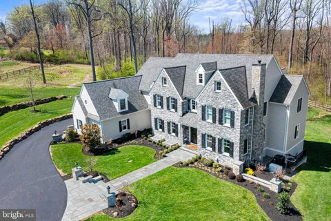 a aerial view of a house with garden