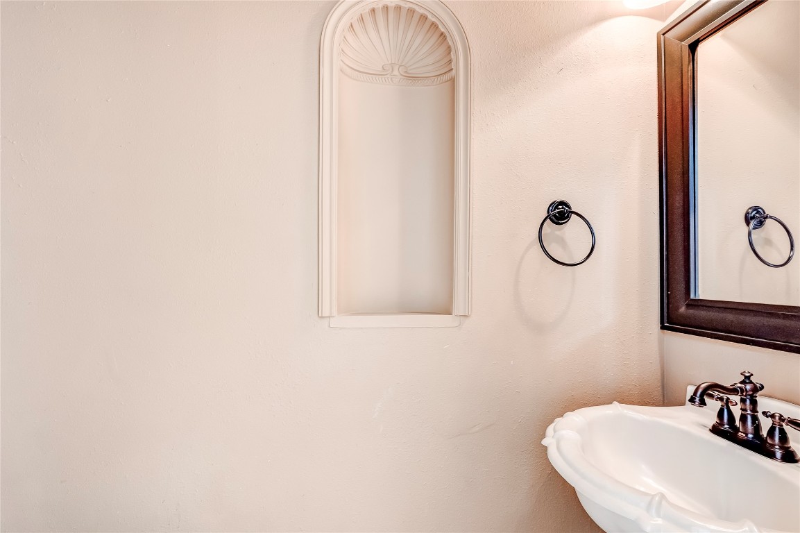 1901 Springwater Drive Round Rock, TX 78681 - Photo 17 of 36 a bathroom with a sink a mirror and vanity