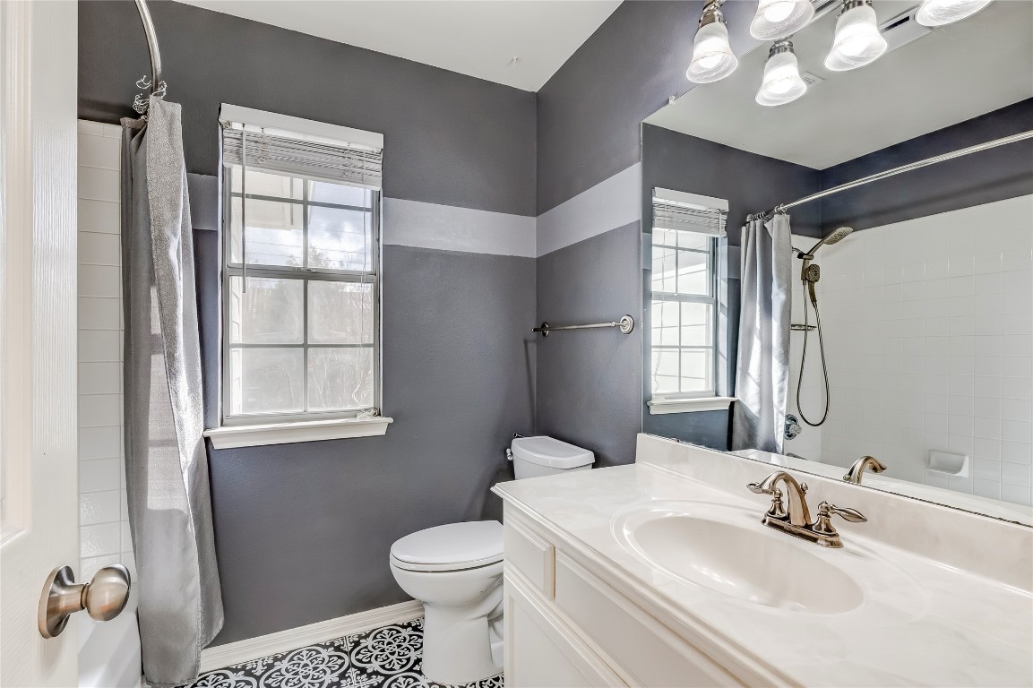 1901 Springwater Drive Round Rock, TX 78681 - Photo 28 of 36 a bathroom with a sink toilet and shower