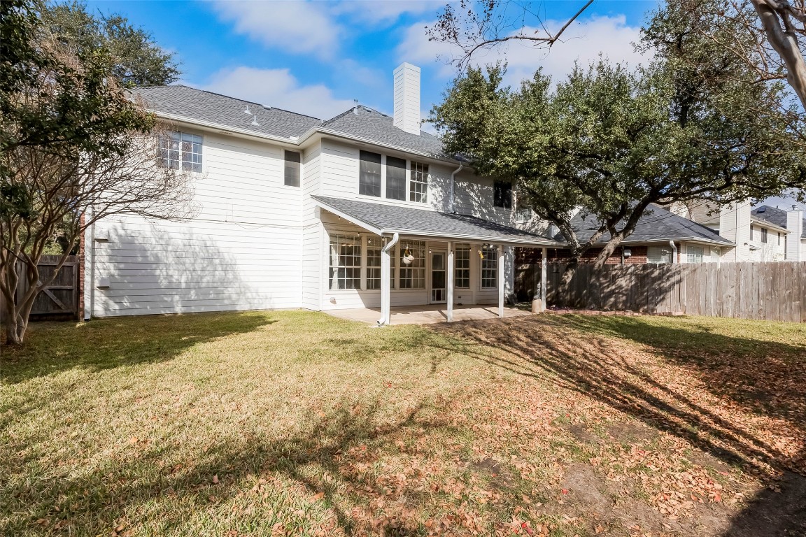 1901 Springwater Drive Round Rock, TX 78681 - Photo 36 of 36 a front view of a house with a yard