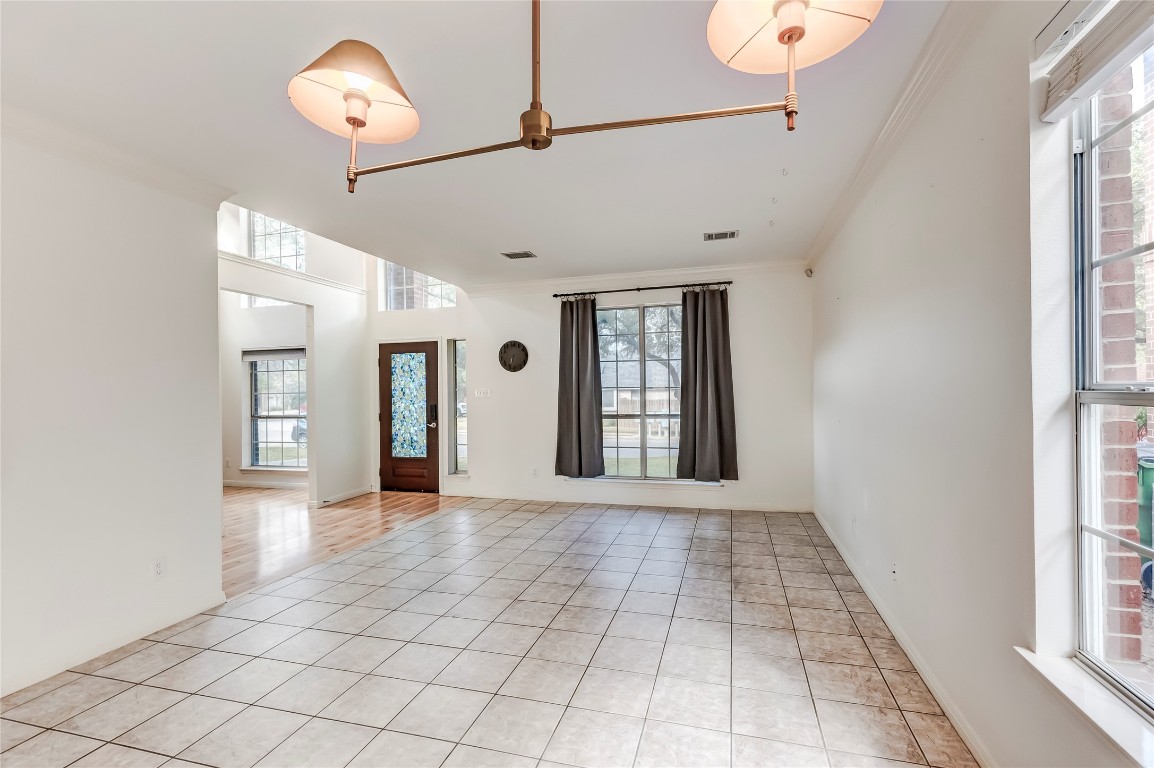 1901 Springwater Drive Round Rock, TX 78681 - Photo 8 of 36 a view of livingroom with window