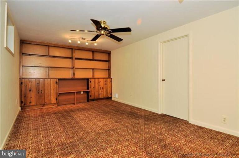 12922 Georgia Avenue Silver Spring, MD 20906 - Photo 5 of 30 Family Rm with built-in bookcases