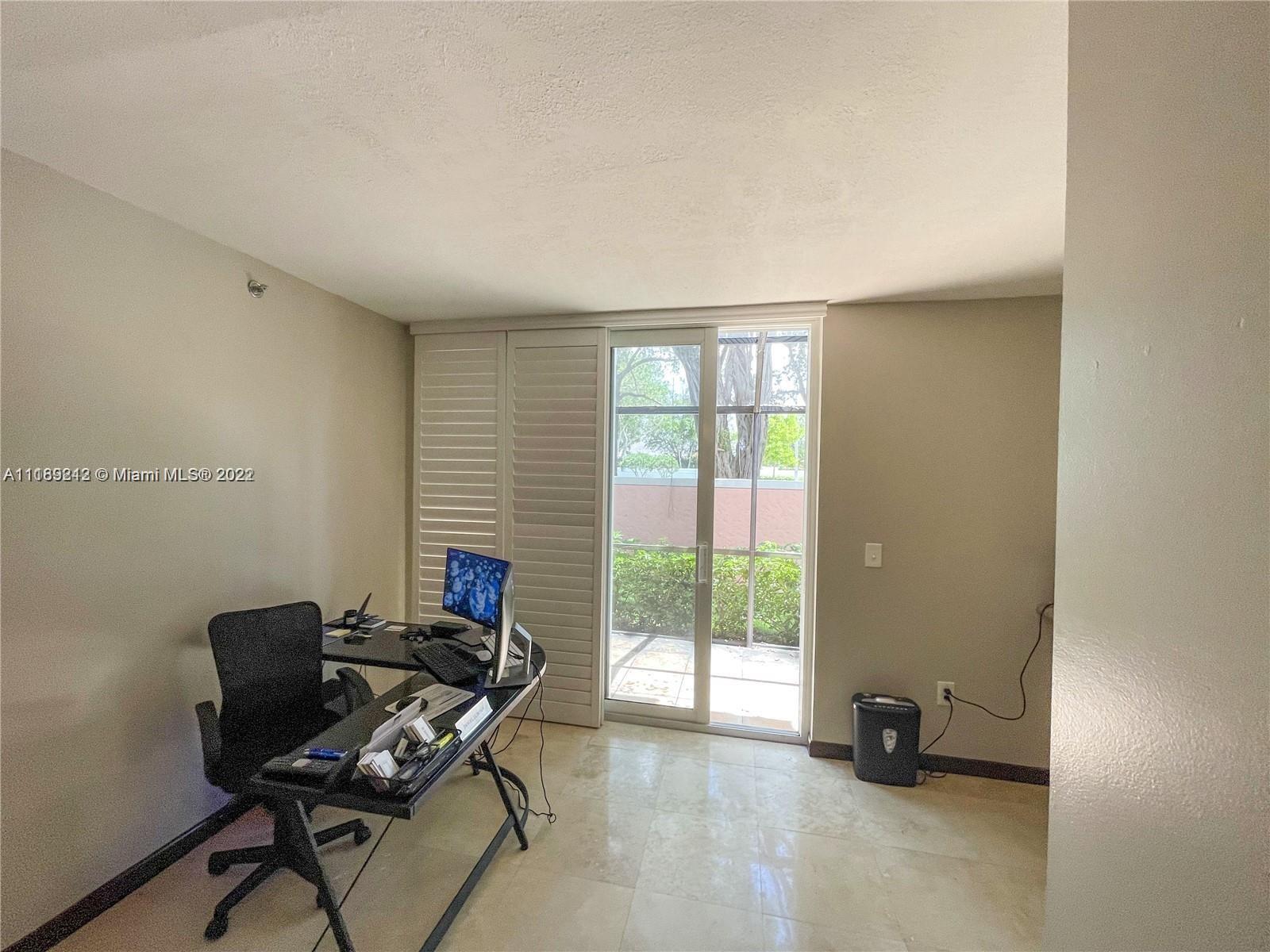 3153 Clint Moore Road, Unit 106 Boca Raton, FL 33496 - Photo 15 of 38 a view of workspace with a window