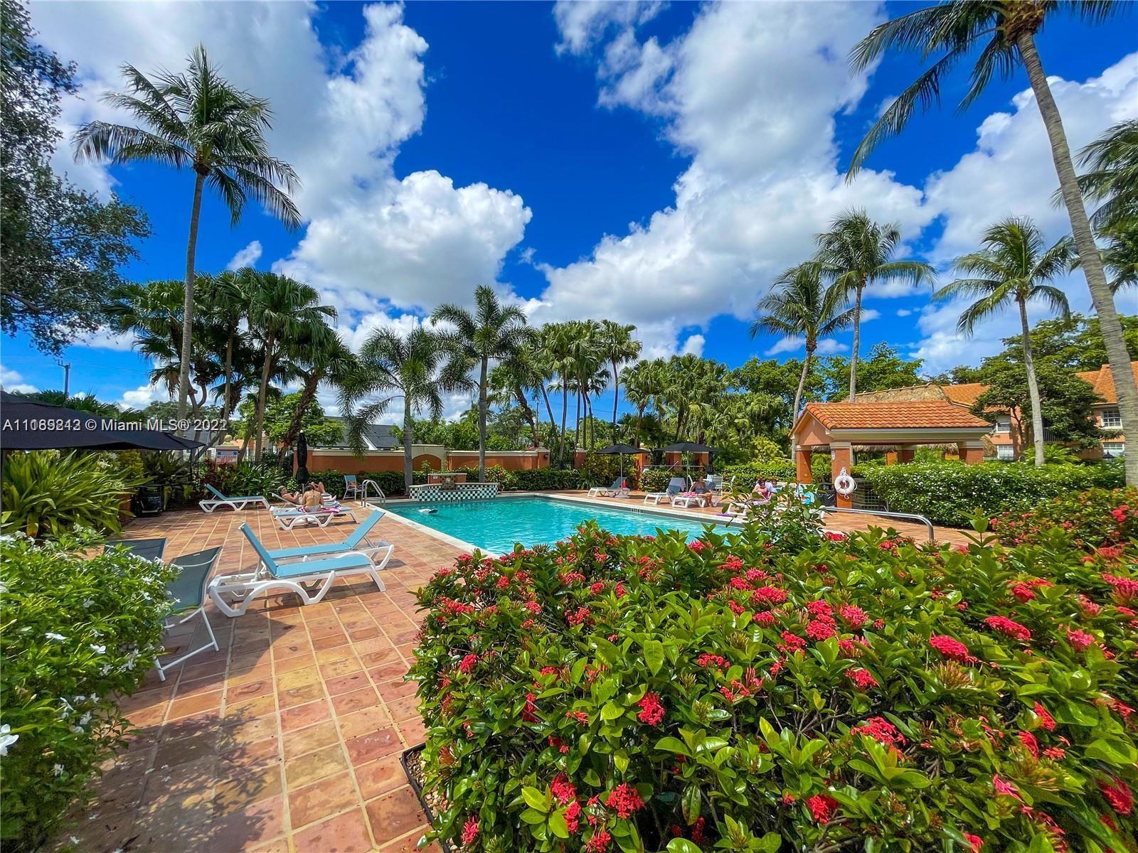 3153 Clint Moore Road, Unit 106 Boca Raton, FL 33496 - Photo 25 of 38 a view of a lake with sitting area