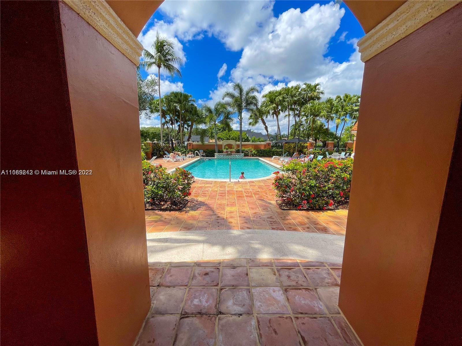 3153 Clint Moore Road, Unit 106 Boca Raton, FL 33496 - Photo 28 of 38 a view of a pathway