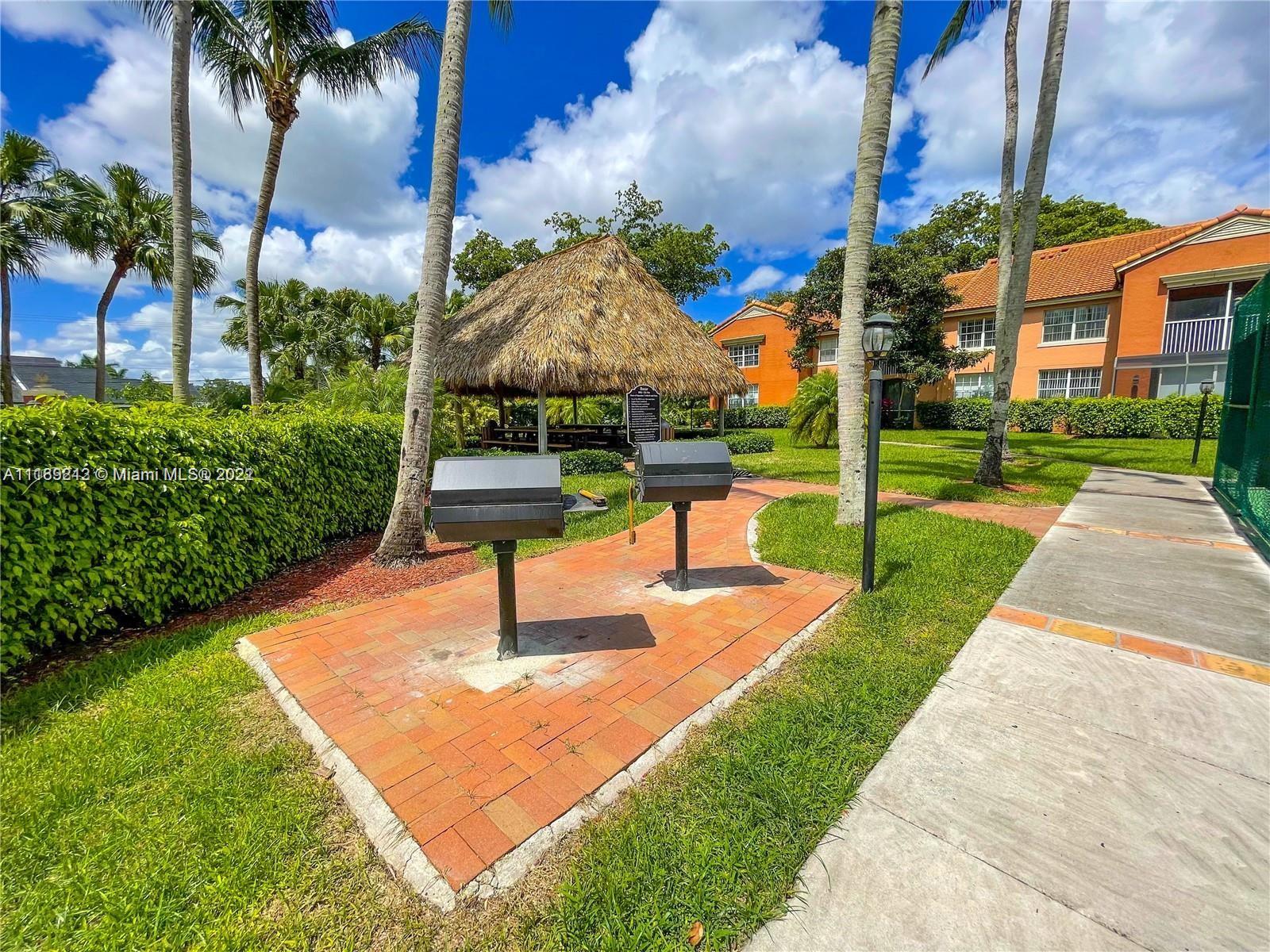 3153 Clint Moore Road, Unit 106 Boca Raton, FL 33496 - Photo 31 of 38 a view of a park with slide