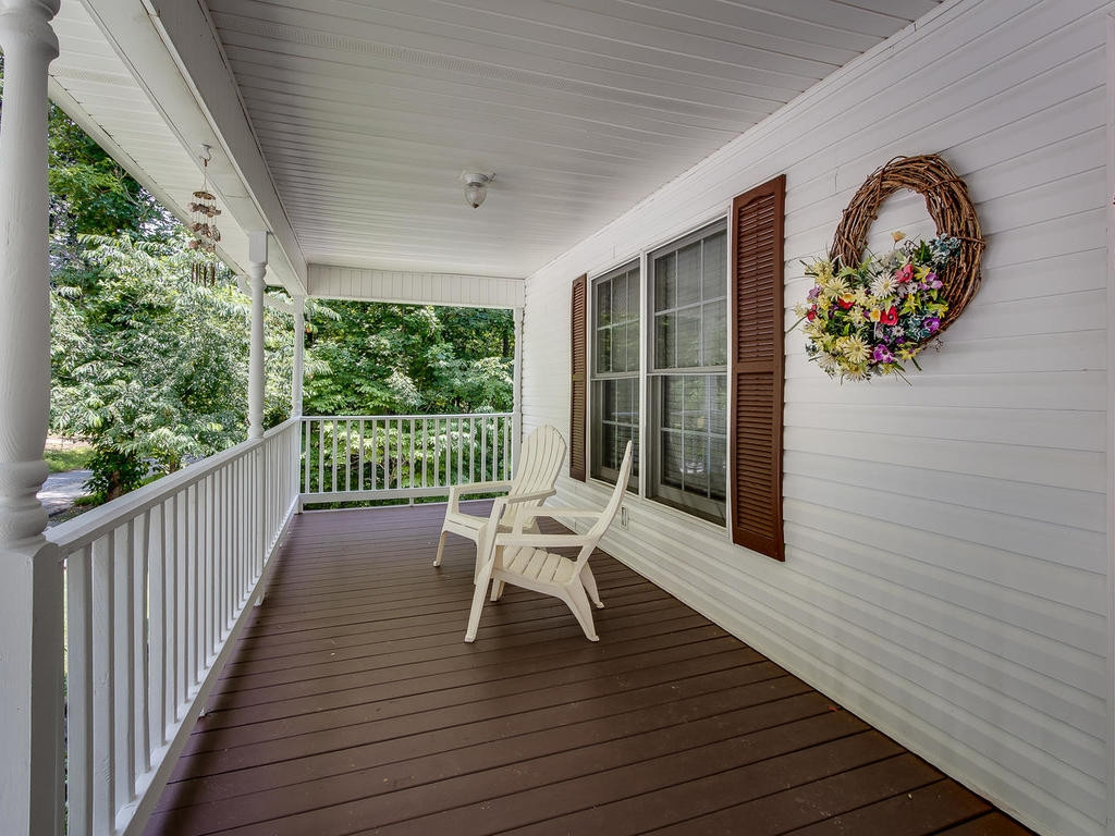 152 Vaughn Road Hampton, TN 37658 - Photo 3 of 29 Sit back and relax front porch