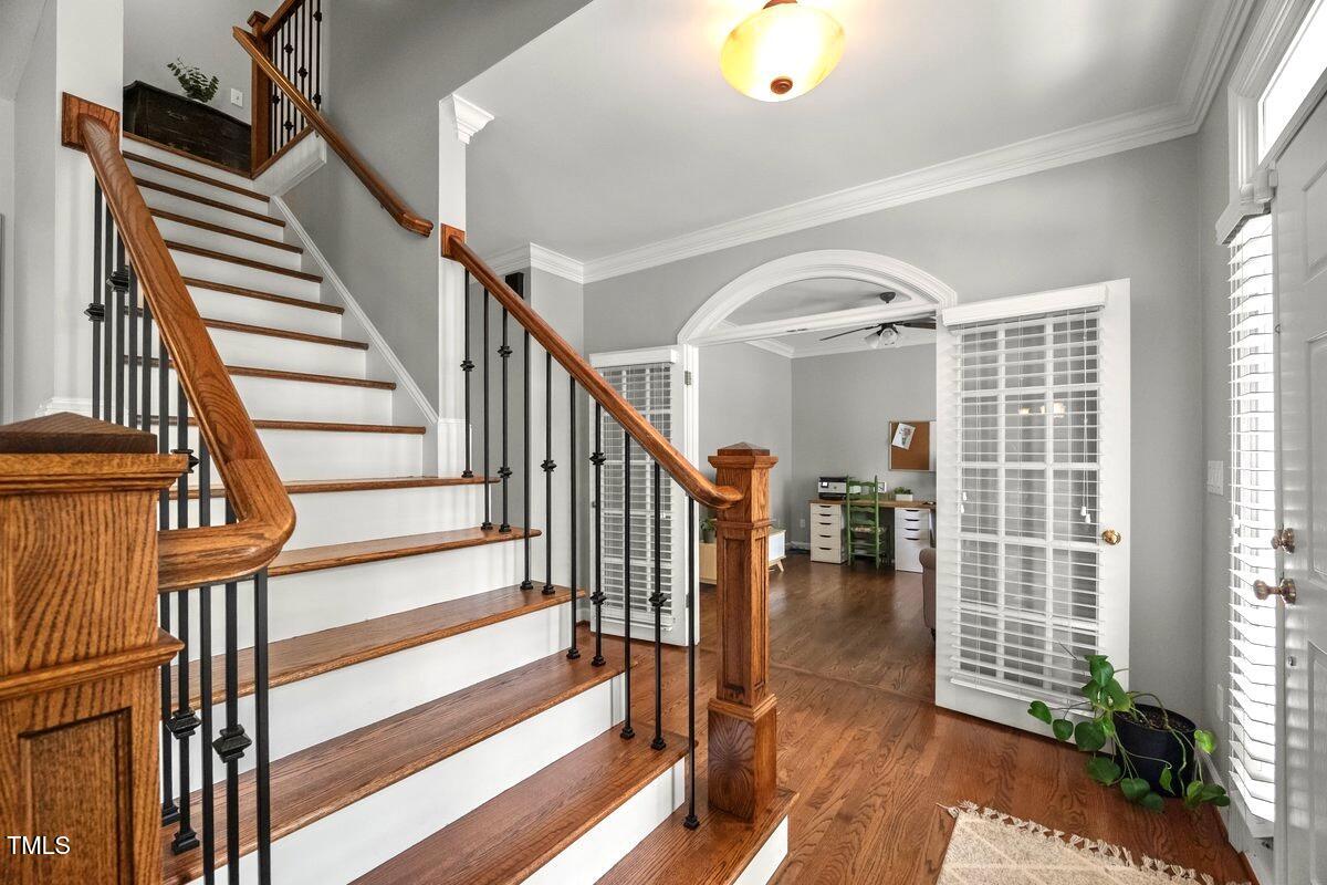 102 Barometer Lane Cary, NC 27513 - Photo 16 of 44 a view of entryway and hall with wooden floor