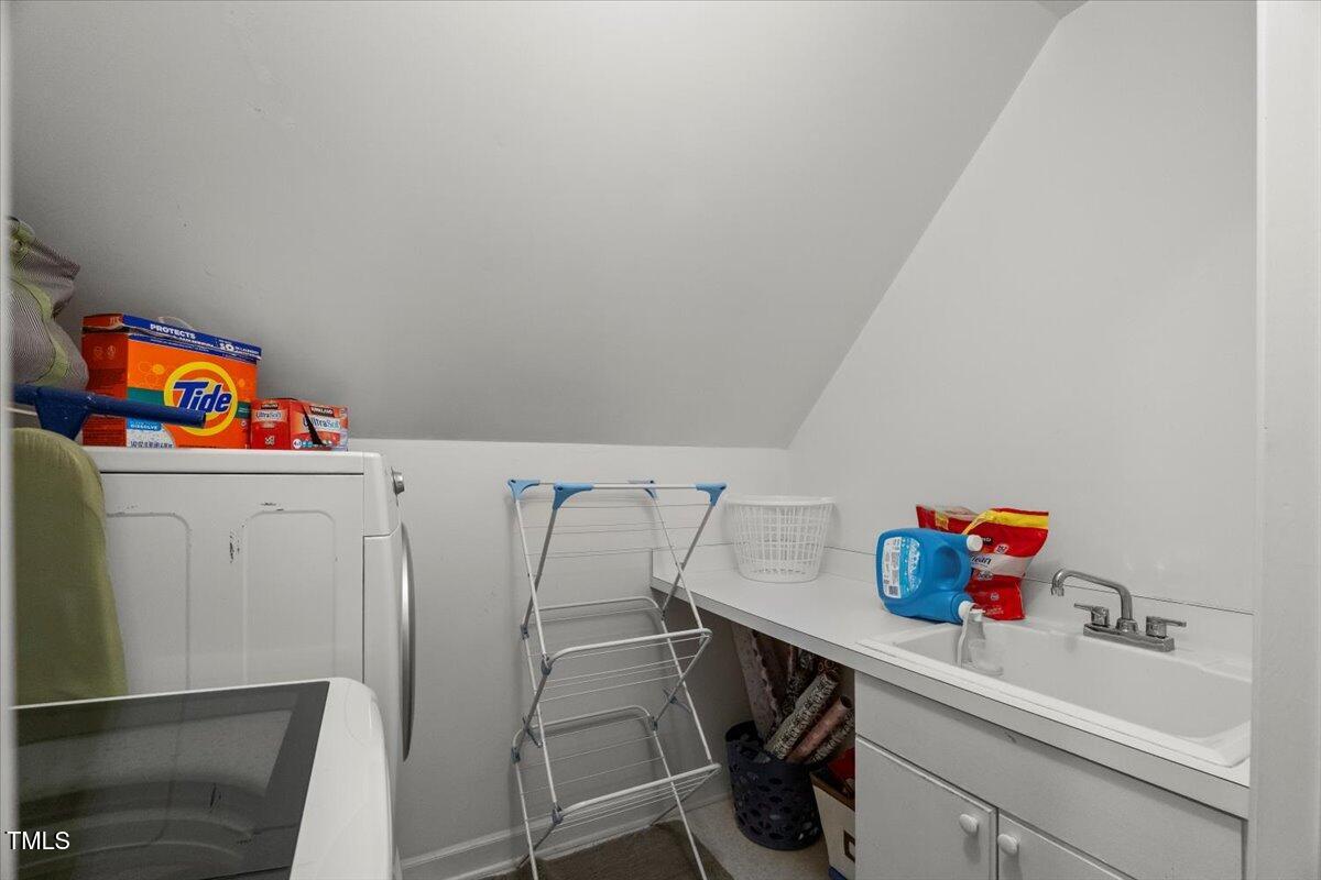 102 Barometer Lane Cary, NC 27513 - Photo 26 of 44 a utility room with dryer and washer